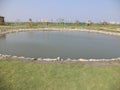 Kolkata, West Bengal/India - February 18, 2014: Cropped view of decorated man made water body inside public park at `Eco Park` Raj