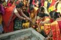 The Hindu devotees are busy in a holy ritual in front of a Homa Kund. Royalty Free Stock Photo