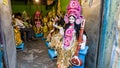 Colorful idols of the Hindu Goddess Durga on display at a sculpture workshop in the