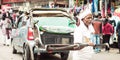 KOLKATA, WEST BENGAL, INDIA - JANUARY 5 2019: A Rickshaw puller carrying a rickshaw also called