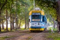 A Tram running through the Maidan on a sunny morning at Kolkata, West Bengal, Royalty Free Stock Photo