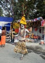 The dancing Hindu monk in a religious fair.