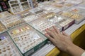 Women checking out jewellery in retails shop