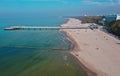 KOLOBRZEG, POLAND - 25 APRIL 2019 - Aerial view on Kolobrzeg city, area of Molo pier at Baltic Sea shore and Baltyk Sanatorium Royalty Free Stock Photo