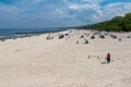 Kolobrzeg, zachodniopomorskie / Poland - May, 21, 2019: Pier in a holiday resort by the sea. A place of rest in Central Europe