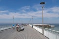 Kolobrzeg, zachodniopomorskie / Poland - May, 21, 2019: Pier in a holiday resort by the sea. A place of rest in Central Europe