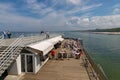 Kolobrzeg, zachodniopomorskie / Poland - May, 21, 2019: Pier in a holiday resort by the sea. A place of rest in Central Europe