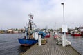 Kolobrzeg, zachodniopomorskie / Poland - May, 14, 2021:. A port in a town in northern Poland. Watercraft moored at the port quay