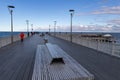 Kolobrzeg, zachodniopomorskie / Poland - October, 30, 2019: Pier in a holiday resort by the sea. A place of rest in Central Europe