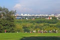 Kolomenskoye park. Many people walk in the park.