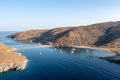 Kolona Fykiada double sided sandy beach, aerial drone view. Greece, Kithnos island, Cyclades Royalty Free Stock Photo