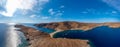 Kolona Fykiada double sided sandy beach, panoramic drone view. Greece, Kithnos island, Cyclades Royalty Free Stock Photo