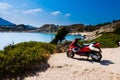 Kolymbia beach with motorcycle Royalty Free Stock Photo