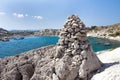 Kolymbia beach with the rocky coast and stone