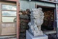 Komainu lion-dog guardian statue of Kusushi Shinto Shrine on the Royalty Free Stock Photo