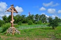 Komarov Lotus and Orthodox cross in the village of Novogordeevka. Anuchinsky district, Primorsky Krai