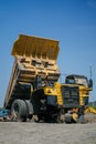 Komatsu dump truck in service. The front wheels have been removed.