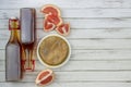 Kombucha superfood pro biotic tea fungus beverage in glass bottle with grapefruit on white background Royalty Free Stock Photo