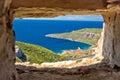 Komiza bay aerial view through stone window Royalty Free Stock Photo