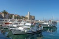 Komiza, Croatia - Aug 16, 2020: Old town port view in sunny afternoon Royalty Free Stock Photo