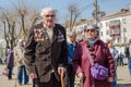 Komsomols-on-Amur, Russia - May 5, 2019. Russian elderly hard worker drummer with a lot of medals