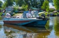 Old fishing boat and swampy banks of the Dnieper River. Fishing in Eastern Europe Royalty Free Stock Photo