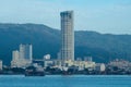 KOMTAR building in afternoon from sea.