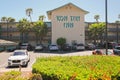 Kon Tiki Inn hotel, front view, and parking. Hotel located on the coastline midway between San Francisco and Los Angeles