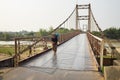 Kon Tum, Vietnam - Mar 28, 2016: Kon Klor Suspension Bridge, road to famous destination old minority village Kon Kotu in Kon Tum, Royalty Free Stock Photo