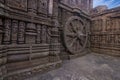 A chariot wheel carved into the wall of the 13th century Konark Sun or Surya Temple, Odisha, India.