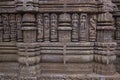 Ancient sandstone carvings on the walls of the ancient 13th century sun temple at Konark, Odisha, India. Royalty Free Stock Photo