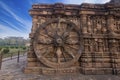 A chariot wheel carved into the wall of the 13th century Konark Sun Temple, Odisha, India. Royalty Free Stock Photo