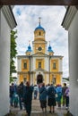 Konevets, Russia July 22, 2023 Konevsky Monastery on the island of Konevets on Lake Ladoga. A group of pilgrims enter