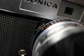 Konica vintage rangefinder camera auto s 1.6 35mm on a black background. Royalty Free Stock Photo