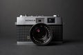 Konica vintage rangefinder camera auto s 1.6 35mm on a black background. Royalty Free Stock Photo