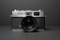 Konica vintage rangefinder camera auto s 1.6 35mm on a black background. Royalty Free Stock Photo