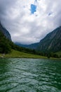 Konigsee lake with st Bartholomew church surrounded by mountains, Berchtesgaden National Park, Bavaria, Germany Royalty Free Stock Photo