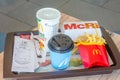 McRib sandwich, french fries, Sprite and cup with tea in German McDonald`s