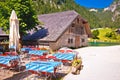 Konigssee coast Bavarian Alpine landscape and old wooden architecture view