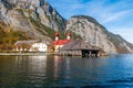 Konigssee lake Konigsee in foggy weather, St. Bartholoma church the background Watzmann mountains , near the German Austrian Royalty Free Stock Photo