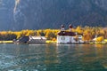 Konigssee lake Konigsee in foggy weather, St. Bartholoma church the background Watzmann mountains , near the German Austrian Royalty Free Stock Photo