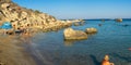 Konnos bay beach in Cyprus next to the Mediterranean Sea in the late afternoon with pleasure boats and concession area.