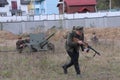 Ukrainians reenact a battle between the Ukrainian Insurgent Army UPA and the Red Army as they mark the `Day of defender`