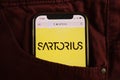 KONSKIE, POLAND - August 17, 2021: Sartorius AG logo on mobile phone hidden in jeans pocket