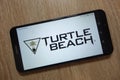 Turtle Beach Corporation logo displayed on smartphone