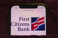 KONSKIE, POLAND - February 22, 2022: First Citizens BancShares Inc logo on mobile phone hidden in jeans pocket