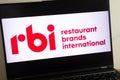 KONSKIE, POLAND - July 21, 2022: Restaurant Brands International Inc RBI fast food holding company logo displayed on laptop