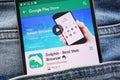 Dolphin - Best Web Browser app on Google Play Store website displayed on smartphone hidden in jeans pocket