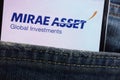 Mirae Asset Global Investments logo displayed on smartphone hidden in jeans pocket Royalty Free Stock Photo