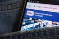 National Institutes of Health NIH website displayed on smartphone hidden in jeans pocket